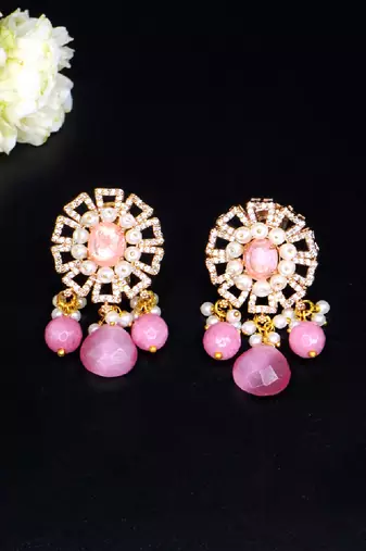 Elegant drop earrings with intricate stone and pearl detailing