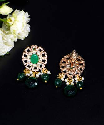 Elegant drop earrings with intricate stone and pearl detailing 2