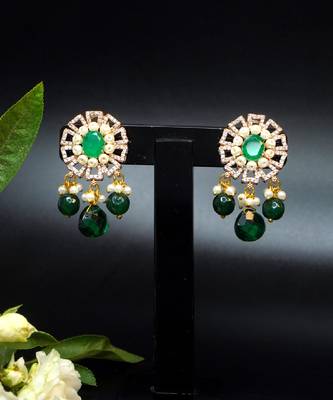 Elegant drop earrings with intricate stone and pearl detailing 3