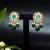 Elegant drop earrings with intricate stone and pearl detailing