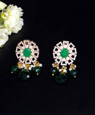 Elegant drop earrings with intricate stone and pearl detailing 4