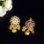 Elegant drop earrings with intricate stone and pearl detailing