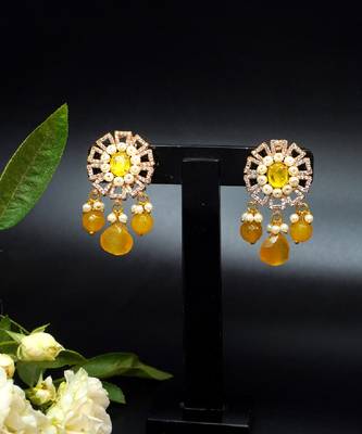 Elegant drop earrings with intricate stone and pearl detailing 4