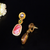 Elegant oval drop earrings with triple gemstone design
