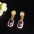 Elegant oval drop earrings with triple gemstone design