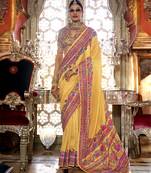 Golden yellow poly viscose silk pashmina saree with printed floral motifs saree
