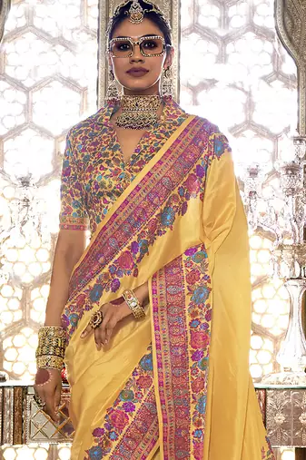 Golden yellow poly viscose silk pashmina saree with printed floral motifs saree
