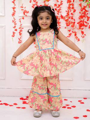 Pink printed cotton kurti and sharara with bow-clip for girls 1