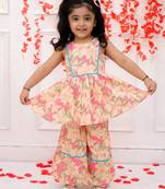 Pink printed cotton kurti and sharara with bow-clip for girls