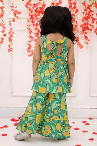 Green printed cotton kurti and sharara with bow-clip for girls