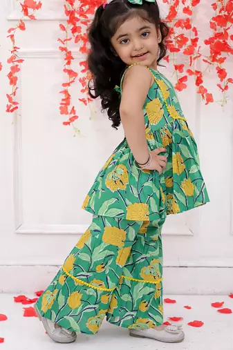 Green printed cotton kurti and sharara with bow-clip for girls