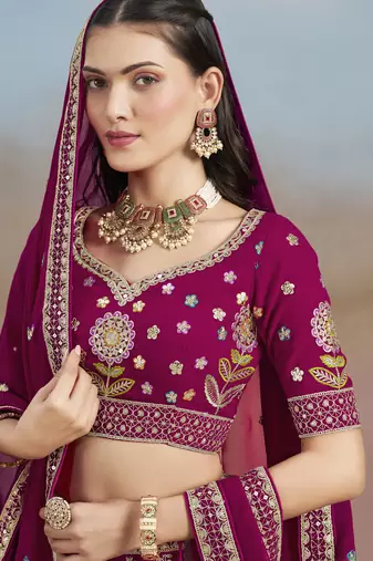 Delightful Pink Sequins, Zari, Dori and Multi Color Thread Embroidered georgette wedding designer indian lehenga choli