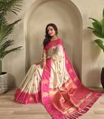 Off white dual tone silk sarees with zari weaves contrast pallu & designer border