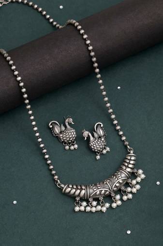 Silver color long oxidised necklace set with elegant tribal design details