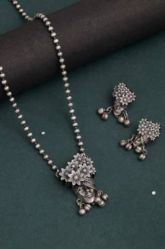 Silver color long oxidised necklace set featuring traditional ethnic charm accents