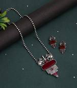 Maroon color long oxidised necklace set with antique finish and artistic touch