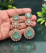 Soft pista green color american diamond earrings for cool spring outfits