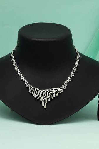 Silver color american diamond necklace set perfect for festive and formal looks