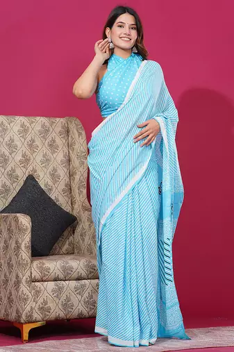 Light turquoise hand block discharge print cotton saree with blouse