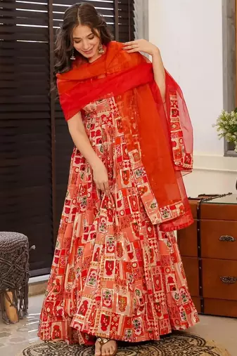 Rust color ceremonial wear stylish gown with dupatta for looks