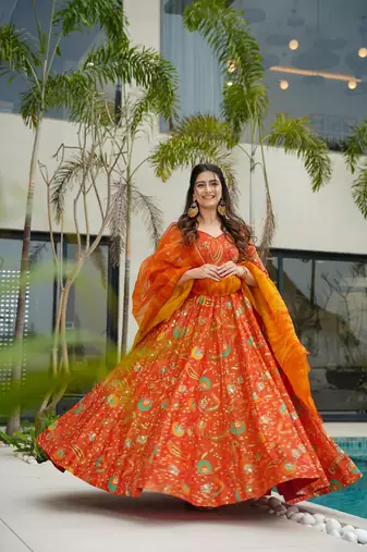 Orange color ceremonial wear stylish girlie gown with dupatta for ethnic looks