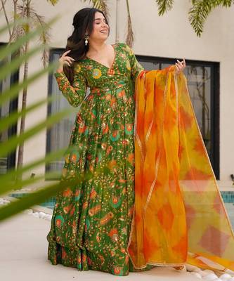 Mahendi color ceremonial wear stylish gown with dupatta for looks 1