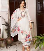 Off white color beautiful ceremonial chanderi silk fabric embroidered festive suit