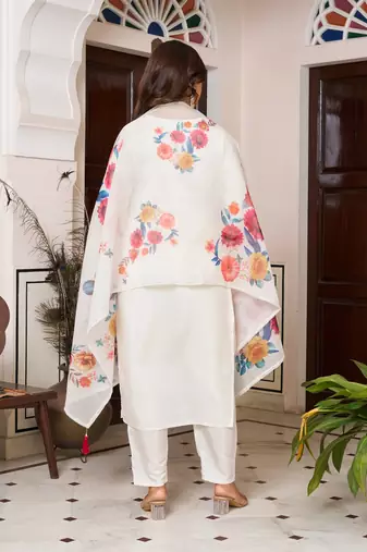 Off white color beautiful ceremonial chanderi silk embroidered festive suit