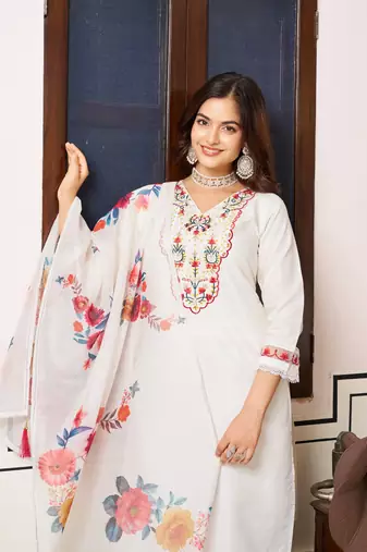 Off white color beautiful ceremonial chanderi silk embroidered festive suit