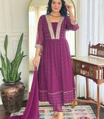 Purple color beautiful ceremonial georgette fabric embroidered festive suit