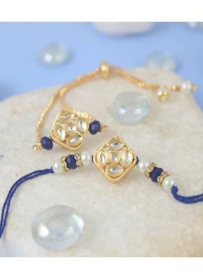 Gold-plated set of 2 handmade unisex rakhi for bhaiya bhabhi with roli chawal and written greeting note. 1