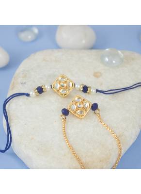 Gold-plated set of 2 handmade unisex rakhi for bhaiya bhabhi with roli chawal and written greeting note. 4