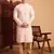 Beautiful peach color smart printed men's festive wear kurta