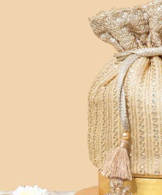 Beige silk embroidered potli bag 2