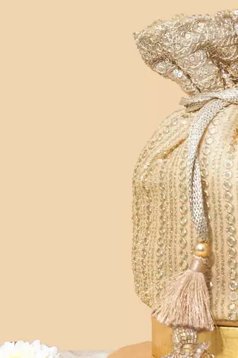 Beige silk embroidered potli bag