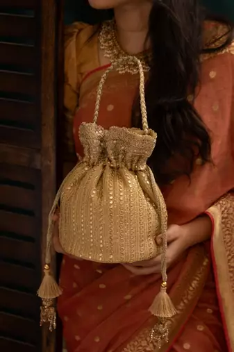 Beige silk embroidered potli bag