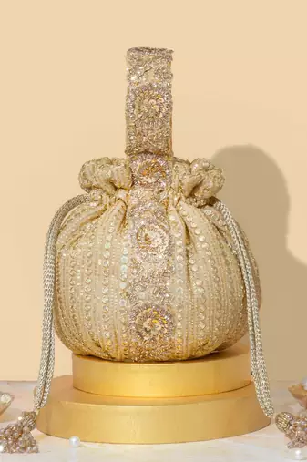 Gold silk embroidered potli bag