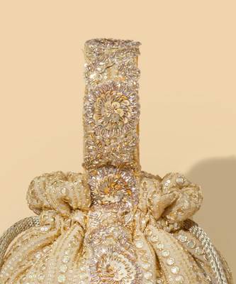 Gold silk embroidered potli bag 4