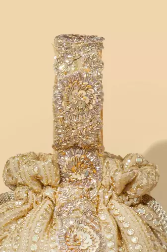 Gold silk embroidered potli bag