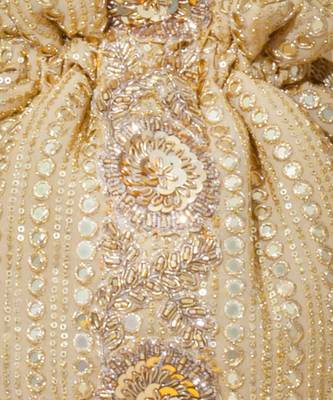 Gold silk embroidered potli bag 5
