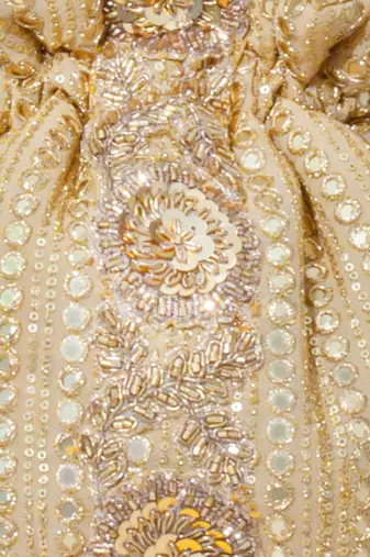 Gold silk embroidered potli bag