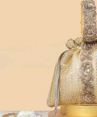 Gold silk embroidered potli bag 3