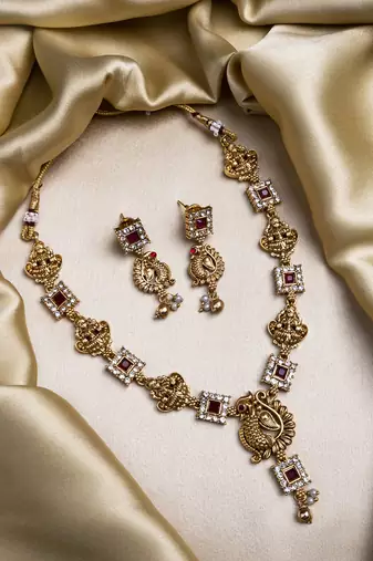 Gold plated sleek red peacock necklace set