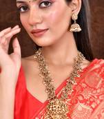 Gold tone beautifully crafted temple necklace with earrings