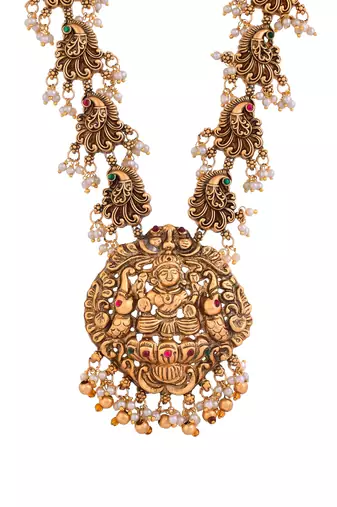 Gold tone beautifully crafted temple necklace with earrings
