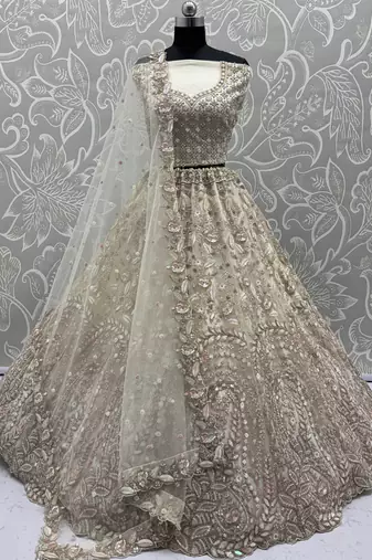 Cream Zircon Work Net Bridesmaid Lehenga Choli With Dupatta