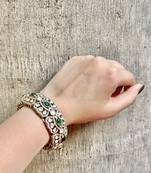 Gold plated green studded bangle
