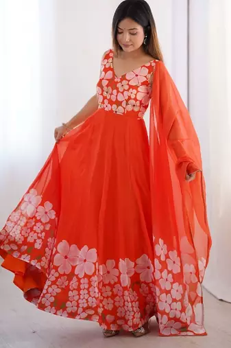 orange floral organza gown with handwork and matching dupatta