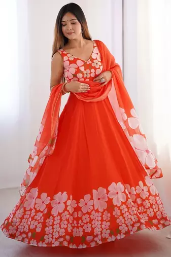 orange floral organza gown with handwork and matching dupatta