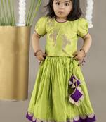 Green  cotton silk embroidered girls gharara paired with blouse